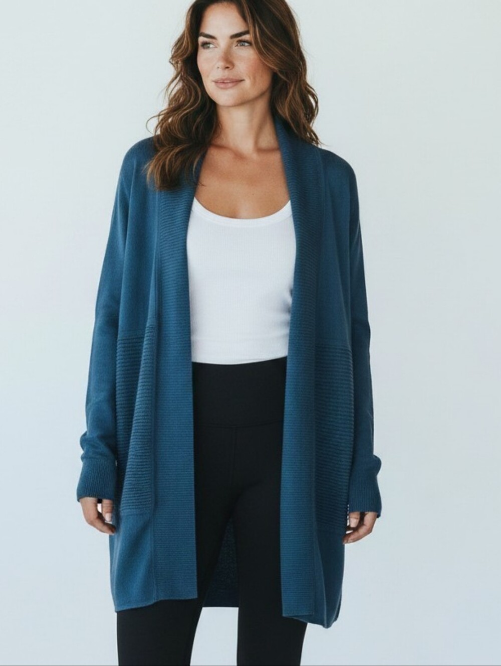 Lululemon Sit In Lotus Wrap II cardigan in Petrol Blue. Merino wool open-front